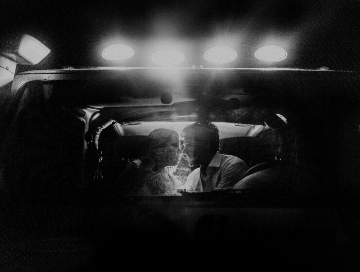 Couple talking softly in a car at night, symbolising intimate relationship communication – SheJournal